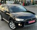 Черный Мицубиси Аутлендер, объемом двигателя 2.3 л и пробегом 124 тыс. км за 11999 $, фото 2 на Automoto.ua