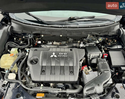 Черный Мицубиси Аутлендер, объемом двигателя 2.2 л и пробегом 215 тыс. км за 11450 $, фото 34 на Automoto.ua