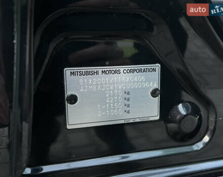 Чорний Міцубісі Аутлендер, об'ємом двигуна 2.3 л та пробігом 124 тис. км за 11999 $, фото 85 на Automoto.ua