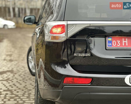 Чорний Міцубісі Аутлендер, об'ємом двигуна 2.2 л та пробігом 176 тис. км за 13500 $, фото 10 на Automoto.ua