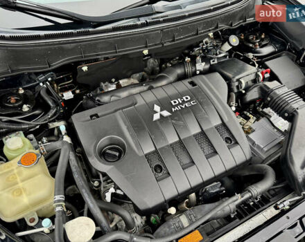 Черный Мицубиси Аутлендер, объемом двигателя 2.2 л и пробегом 215 тыс. км за 11450 $, фото 35 на Automoto.ua