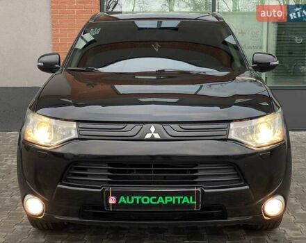 Черный Мицубиси Аутлендер, объемом двигателя 2.36 л и пробегом 212 тыс. км за 12990 $, фото 3 на Automoto.ua