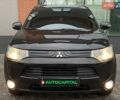 Черный Мицубиси Аутлендер, объемом двигателя 2.36 л и пробегом 212 тыс. км за 12990 $, фото 3 на Automoto.ua