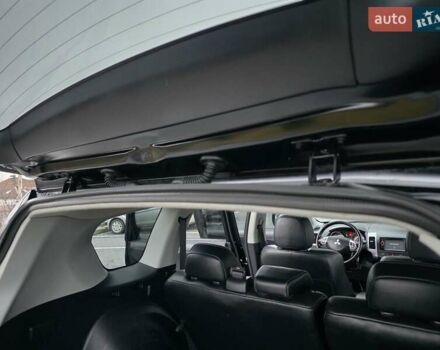 Черный Мицубиси Аутлендер, объемом двигателя 2.2 л и пробегом 188 тыс. км за 10999 $, фото 31 на Automoto.ua