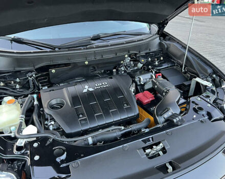 Чорний Міцубісі Аутлендер, об'ємом двигуна 2.3 л та пробігом 124 тис. км за 11999 $, фото 95 на Automoto.ua