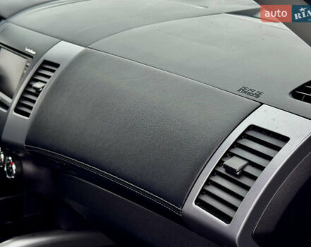 Черный Мицубиси Аутлендер, объемом двигателя 2.2 л и пробегом 215 тыс. км за 11450 $, фото 28 на Automoto.ua