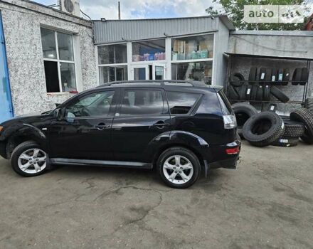 Чорний Міцубісі Аутлендер, об'ємом двигуна 2.36 л та пробігом 164 тис. км за 10800 $, фото 7 на Automoto.ua