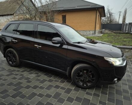 Черный Мицубиси Аутлендер, объемом двигателя 2.4 л и пробегом 211 тыс. км за 12590 $, фото 5 на Automoto.ua