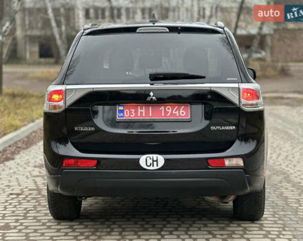 Чорний Міцубісі Аутлендер, об'ємом двигуна 2.2 л та пробігом 176 тис. км за 13500 $, фото 9 на Automoto.ua