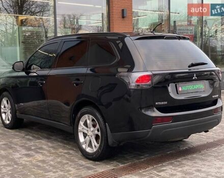 Черный Мицубиси Аутлендер, объемом двигателя 2.36 л и пробегом 212 тыс. км за 12990 $, фото 6 на Automoto.ua