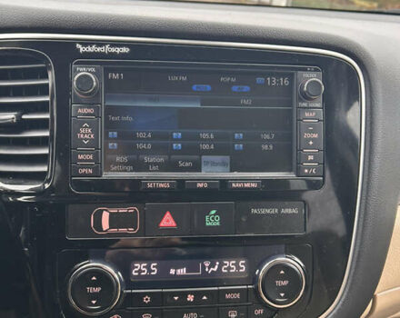 Черный Мицубиси Аутлендер, объемом двигателя 2.27 л и пробегом 202 тыс. км за 13100 $, фото 13 на Automoto.ua