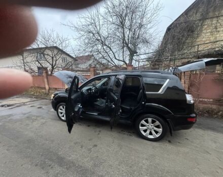 Черный Мицубиси Аутлендер, объемом двигателя 2.4 л и пробегом 136 тыс. км за 14500 $, фото 3 на Automoto.ua