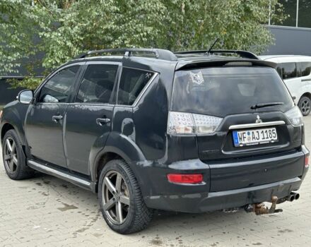Черный Мицубиси Аутлендер, объемом двигателя 2 л и пробегом 250 тыс. км за 4850 $, фото 2 на Automoto.ua