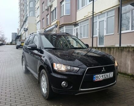Черный Мицубиси Аутлендер, объемом двигателя 2 л и пробегом 235 тыс. км за 10300 $, фото 7 на Automoto.ua
