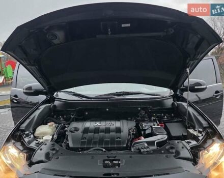 Черный Мицубиси Аутлендер, объемом двигателя 2.2 л и пробегом 188 тыс. км за 10999 $, фото 23 на Automoto.ua