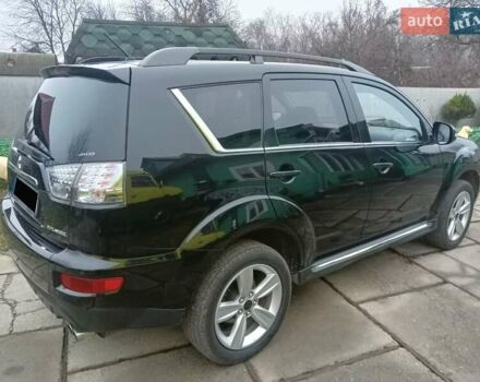 Черный Мицубиси Аутлендер, объемом двигателя 2.2 л и пробегом 218 тыс. км за 11500 $, фото 9 на Automoto.ua