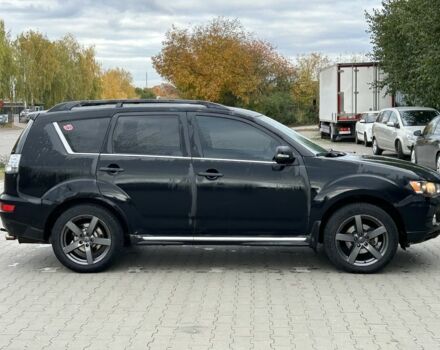 Черный Мицубиси Аутлендер, объемом двигателя 2 л и пробегом 250 тыс. км за 4850 $, фото 5 на Automoto.ua
