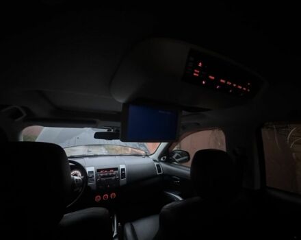 Черный Мицубиси Аутлендер, объемом двигателя 2.4 л и пробегом 136 тыс. км за 14500 $, фото 2 на Automoto.ua