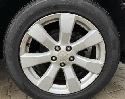 Чорний Міцубісі Аутлендер, об'ємом двигуна 2.36 л та пробігом 96 тис. км за 11700 $, фото 12 на Automoto.ua