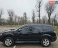 Чорний Міцубісі Аутлендер, об'ємом двигуна 2 л та пробігом 123 тис. км за 10500 $, фото 4 на Automoto.ua