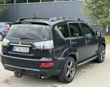 Черный Мицубиси Аутлендер, объемом двигателя 2 л и пробегом 250 тыс. км за 4850 $, фото 4 на Automoto.ua