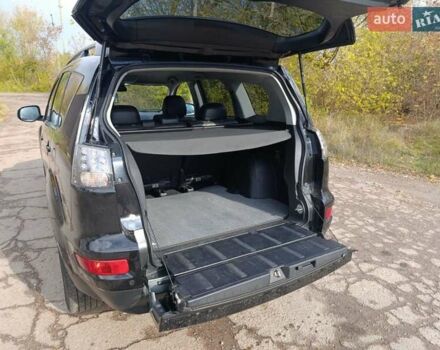 Черный Мицубиси Аутлендер, объемом двигателя 2.2 л и пробегом 218 тыс. км за 11800 $, фото 2 на Automoto.ua