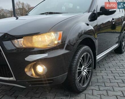 Черный Мицубиси Аутлендер, объемом двигателя 2.2 л и пробегом 188 тыс. км за 10999 $, фото 18 на Automoto.ua