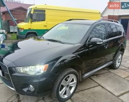 Черный Мицубиси Аутлендер, объемом двигателя 2.2 л и пробегом 218 тыс. км за 11500 $, фото 4 на Automoto.ua