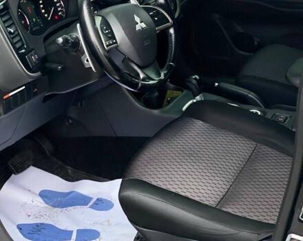 Черный Мицубиси Аутлендер, объемом двигателя 2.36 л и пробегом 212 тыс. км за 12990 $, фото 18 на Automoto.ua