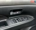 Черный Мицубиси Аутлендер, объемом двигателя 2.36 л и пробегом 212 тыс. км за 12990 $, фото 17 на Automoto.ua