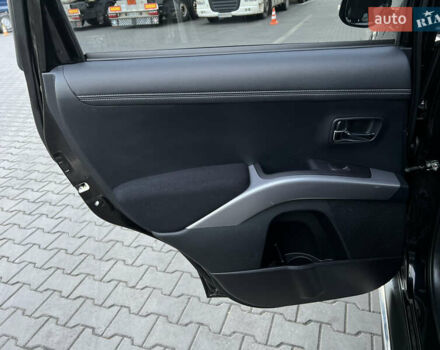 Чорний Міцубісі Аутлендер, об'ємом двигуна 2.3 л та пробігом 124 тис. км за 11999 $, фото 76 на Automoto.ua