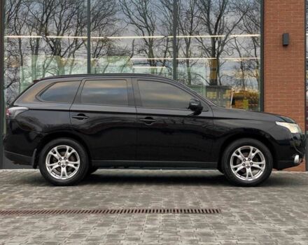 Черный Мицубиси Аутлендер, объемом двигателя 2.4 л и пробегом 212 тыс. км за 12990 $, фото 4 на Automoto.ua