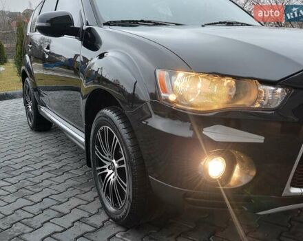 Черный Мицубиси Аутлендер, объемом двигателя 2.2 л и пробегом 188 тыс. км за 10999 $, фото 17 на Automoto.ua