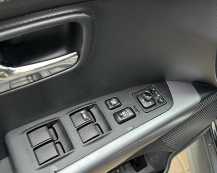 Чорний Міцубісі Аутлендер, об'ємом двигуна 2.36 л та пробігом 96 тис. км за 11700 $, фото 22 на Automoto.ua