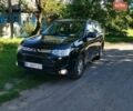 Черный Мицубиси Аутлендер, объемом двигателя 2 л и пробегом 197 тыс. км за 9600 $, фото 1 на Automoto.ua