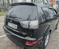 Чорний Міцубісі Аутлендер, об'ємом двигуна 2 л та пробігом 123 тис. км за 10500 $, фото 8 на Automoto.ua