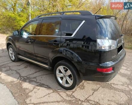 Черный Мицубиси Аутлендер, объемом двигателя 2.2 л и пробегом 218 тыс. км за 11800 $, фото 7 на Automoto.ua