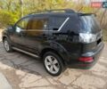 Черный Мицубиси Аутлендер, объемом двигателя 2.2 л и пробегом 218 тыс. км за 11800 $, фото 7 на Automoto.ua