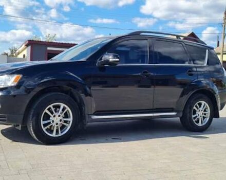 Черный Мицубиси Аутлендер, объемом двигателя 2.27 л и пробегом 195 тыс. км за 10500 $, фото 11 на Automoto.ua