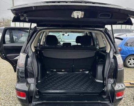 Чорний Міцубісі Аутлендер, об'ємом двигуна 2.36 л та пробігом 210 тис. км за 10500 $, фото 4 на Automoto.ua