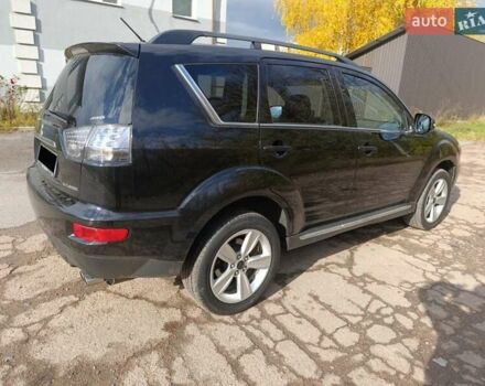Черный Мицубиси Аутлендер, объемом двигателя 2.2 л и пробегом 218 тыс. км за 11800 $, фото 5 на Automoto.ua