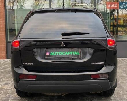 Черный Мицубиси Аутлендер, объемом двигателя 2.36 л и пробегом 212 тыс. км за 12990 $, фото 7 на Automoto.ua