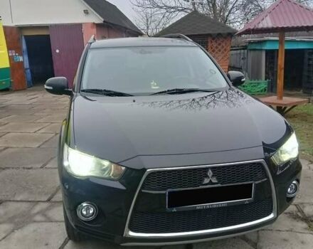 Черный Мицубиси Аутлендер, объемом двигателя 2.2 л и пробегом 218 тыс. км за 11500 $, фото 3 на Automoto.ua