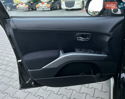 Чорний Міцубісі Аутлендер, об'ємом двигуна 2.3 л та пробігом 124 тис. км за 11999 $, фото 73 на Automoto.ua