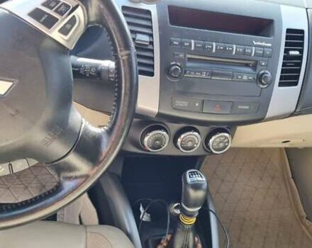 Черный Мицубиси Аутлендер, объемом двигателя 2.27 л и пробегом 195 тыс. км за 10500 $, фото 6 на Automoto.ua