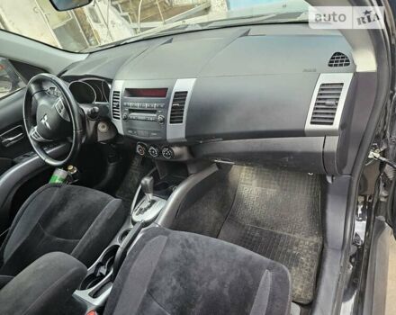 Чорний Міцубісі Аутлендер, об'ємом двигуна 2.36 л та пробігом 164 тис. км за 10800 $, фото 5 на Automoto.ua