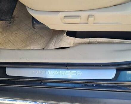 Черный Мицубиси Аутлендер, объемом двигателя 2.27 л и пробегом 195 тыс. км за 10500 $, фото 19 на Automoto.ua