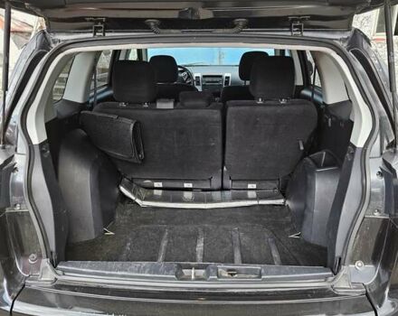 Чорний Міцубісі Аутлендер, об'ємом двигуна 2.36 л та пробігом 164 тис. км за 10800 $, фото 6 на Automoto.ua