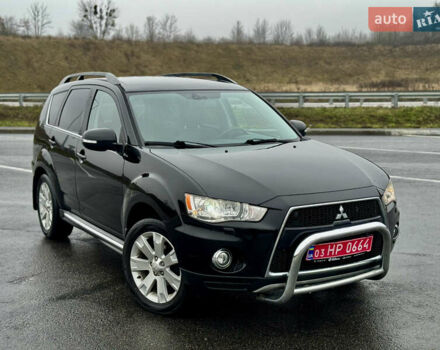 Черный Мицубиси Аутлендер, объемом двигателя 2.2 л и пробегом 215 тыс. км за 11450 $, фото 42 на Automoto.ua