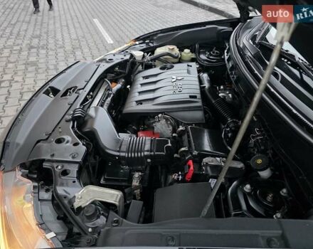 Черный Мицубиси Аутлендер, объемом двигателя 2.2 л и пробегом 188 тыс. км за 10999 $, фото 25 на Automoto.ua